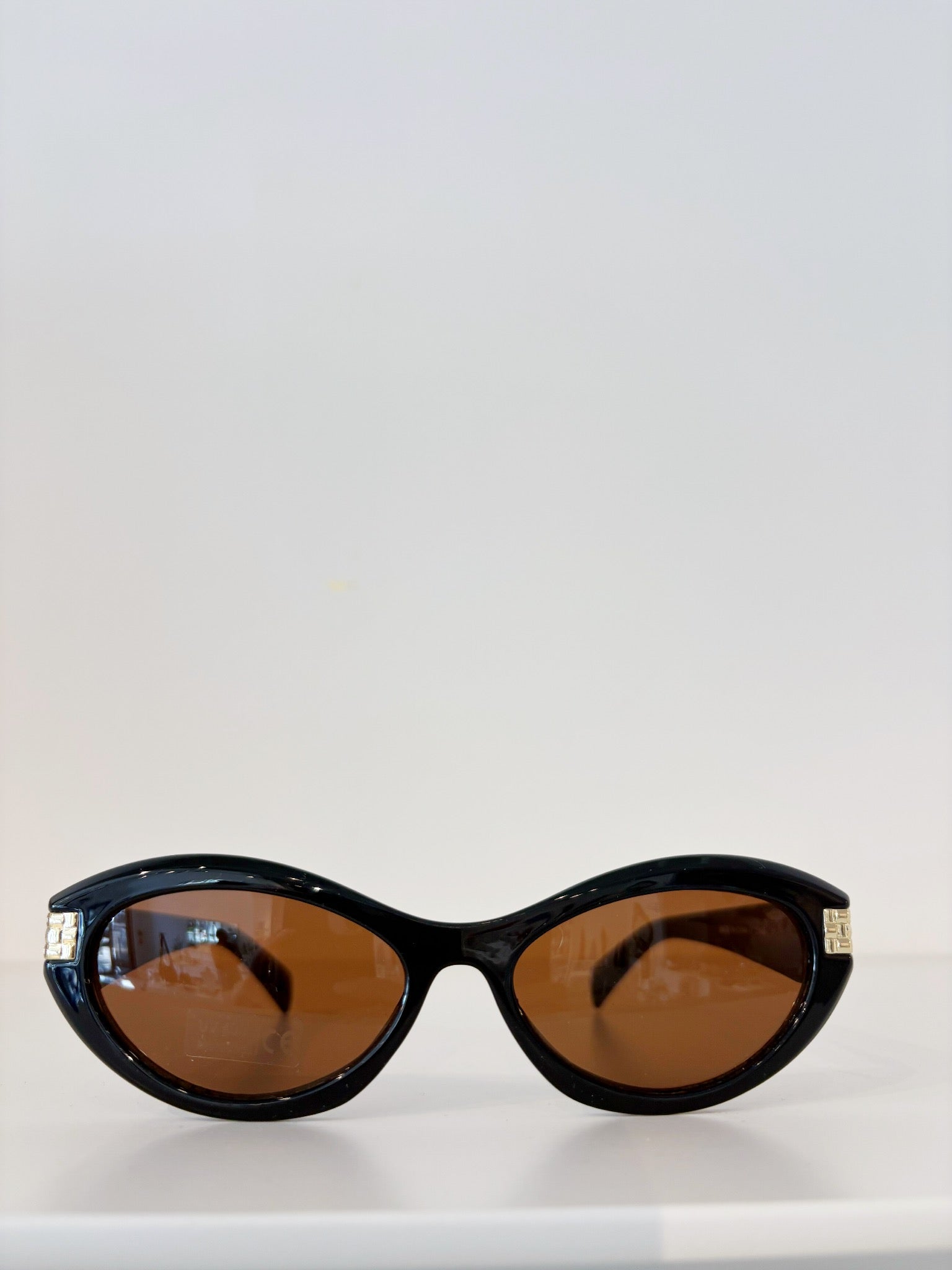 Bordeaux Slim Oval Sunglasses {Black}
